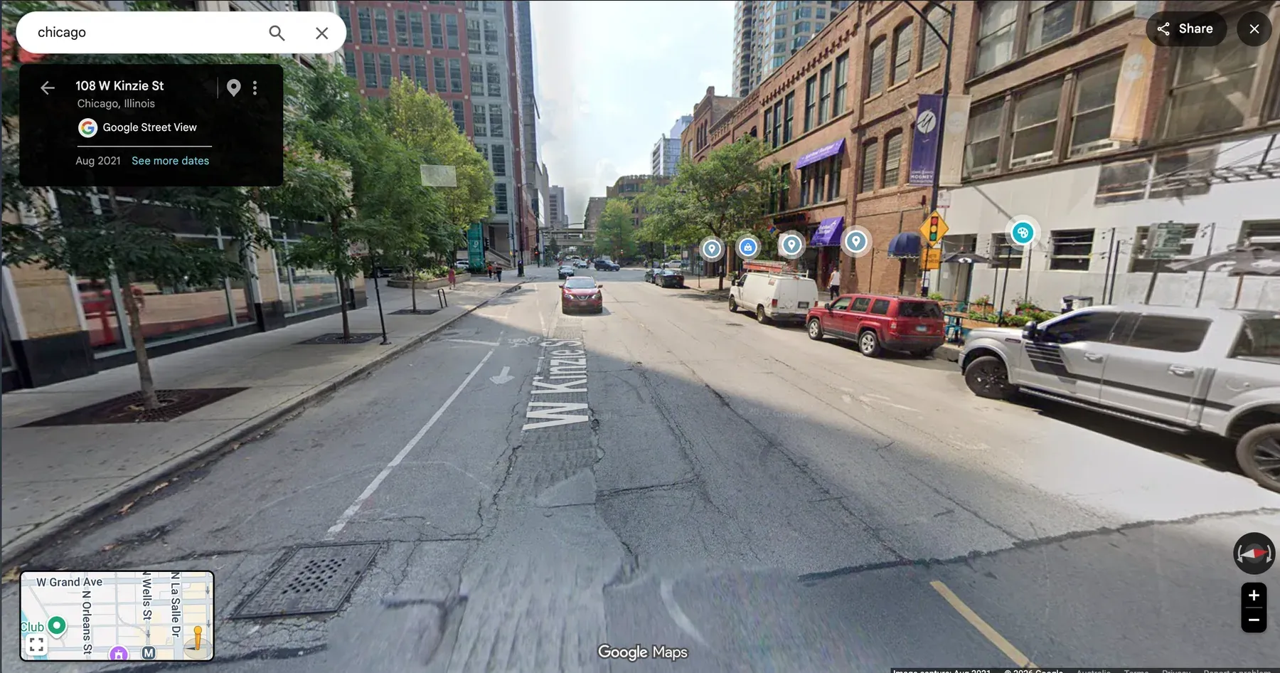 A painted cycle lane sharing road space with vehicles on Kinzie Street in Chicago.
